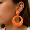 Neonowe kolczyki koła pomarańczowe